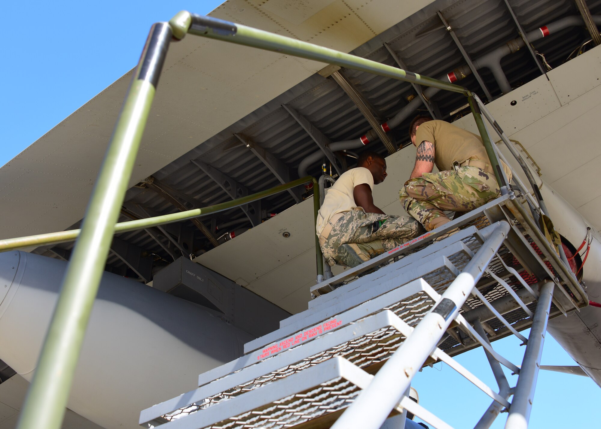 Maintainers work on HC-130J