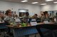 Airmen listen to instruction
