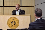 Claiborne Haughton speaks during a National Disability Employment Awareness Month event at the Defense Intelligence Agency Headquarters, Oct.10. During his government career, Haughton led several efforts to promote and protect the employment of persons with disabilities.