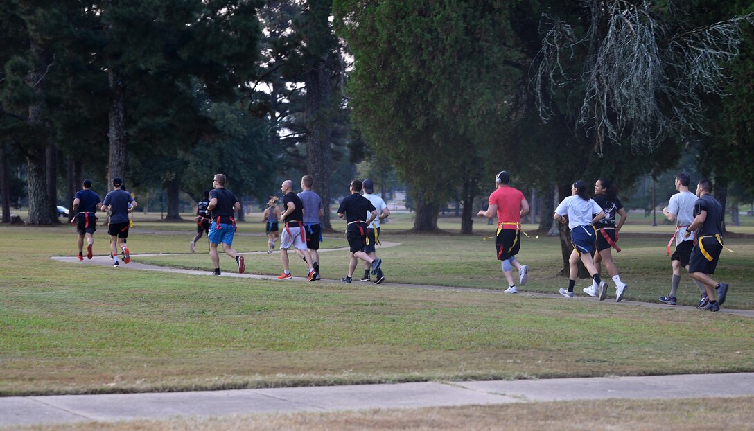 Participants begin running at the Zombie Fun Run Sept. 27, 2019, on Columbus Air Force Base, Miss. The run consisted of a 2-mile run along the BLAZE Fit Trail with four infected zones for runners to try to escape from the living dead. (U.S. Air Force photo by Airman 1st Class Hannah Bean)