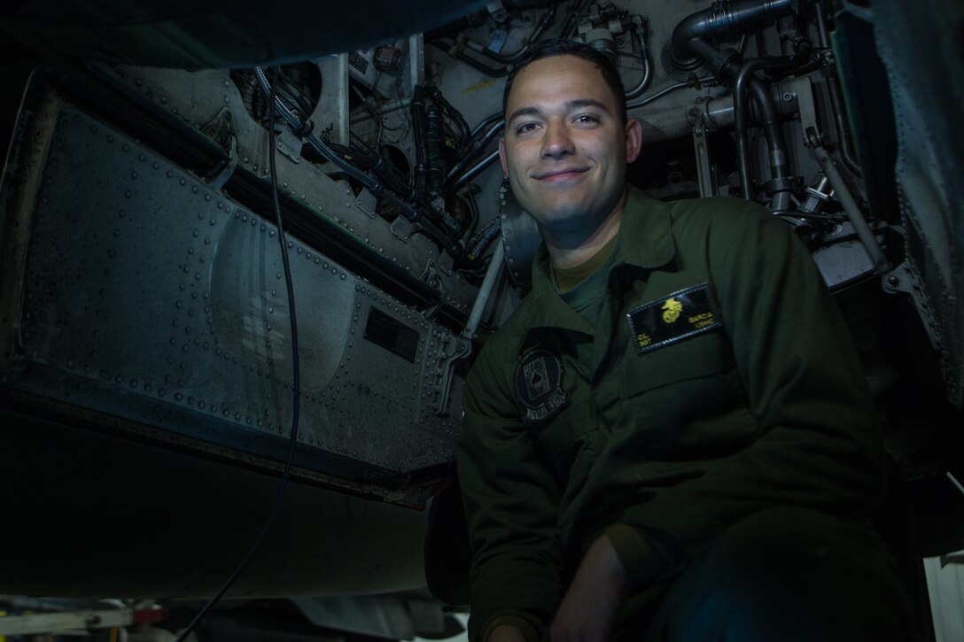 Marine Sgt. Cesar Garcia performs preventative maintenance on an AV-8B Harrier II during exercise Banzai Badlands in Sioux Falls, S.D., Oct. 11, 2019. Marine Attack Squadron 231 and the 114th Fighter Wing of the South Dakota Air National Guard participated in a three-day exercise consisting of simulated air-to-air combat and air-to-ground strikes. Garcia is an avionic technician with VMA-231, Marine Aircraft Group 14, 2nd Marine Aircraft Wing. (U.S. Marine Corps photo by Lance Cpl. Gavin Umboh)