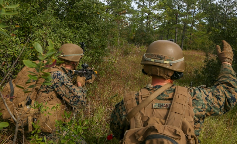 U.S. Marines with Weapons Company, Battalion Landing Team, 2nd Battalion, 8th Marine Regiment, 26th Marine Expeditionary Unit, provide security during a Tactical Recovery of Aircraft and Personnel mission as part of Composite Training Unit Exercise in the vicinity of Camp Lejeune, N.C., Oct. 19, 2019. Bataan is underway conducting a COMPTUEX with the Bataan Amphibious Ready Group and 26th MEU. (U.S. Marine Corps photo by Lance Cpl. Gary Jayne III)