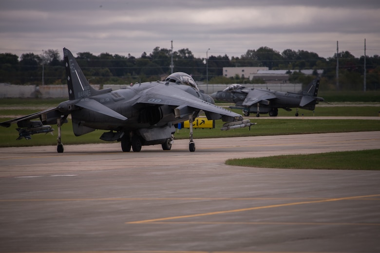 Two AV-8B II Harrier attack jets from Marine Attack Squadron 231 prepare for take-off during a training mission with the 175th Fighter Squadron, 114th Fighter Wing of the South Dakota Air National Guard at Joe Foss Field, Sioux Falls, South Dakota, Oct. 4 2019. VMA-231 and the 114th FW are participating in force-on-force training consisting of simulated air-to-air combat and air-to-ground strikes to enhance interoperability and readiness. The Harrier attack jets are from VMA-231, Marine Aircraft Group 14, 2nd Marine Aircraft Wing. (U.S. Marine Corps photo by Lance Cpl. Gavin Umboh)