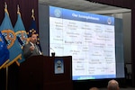 DLA Disposition Services Director Mike Cannon reviews accomplishments for the past year with the summit attendees.