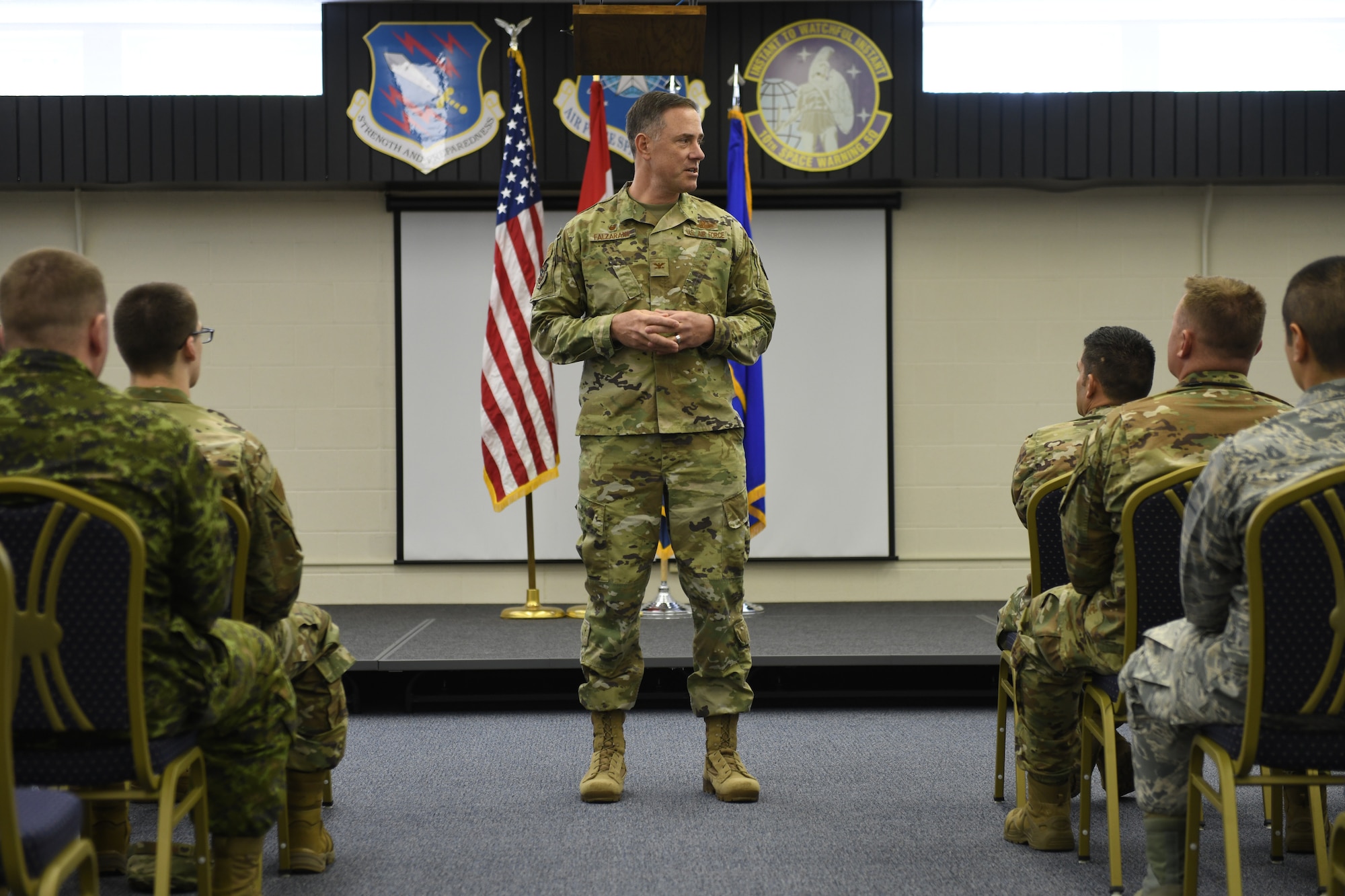 Col. Thomas Falzarano, 21st Space Wing commander, speaks at a commander’s call Sept. 27, 2019, on Cavalier Air Force Station, North Dakota. Falzarano spoke about the importance of space superiority and suicide prevention in today’s military. (U.S. Air Force photo by Airman 1st Class Andrew Bertain)