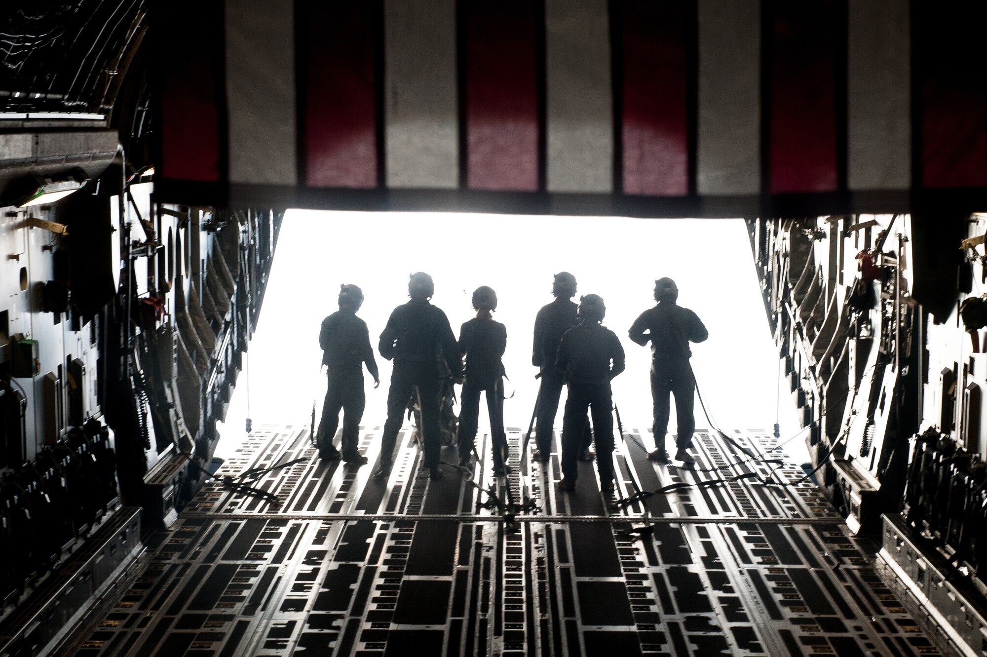 The skies aligned for two pilots and former college football players who were able to support their alma maters in a once-in-a-lifetime way on game day. Maj. Britton Komine, 204th Airlift Squadron, and Capt. Nathaniel Dreslinski, 535th Airlift Squadron, flew the C-17 Globemaster III over Aloha Stadium Saturday, Oct. 19, to demonstrate the power of the Air Force’s most flexible cargo aircraft at the U.S. Air Force Academy versus the University of Hawaii football game.