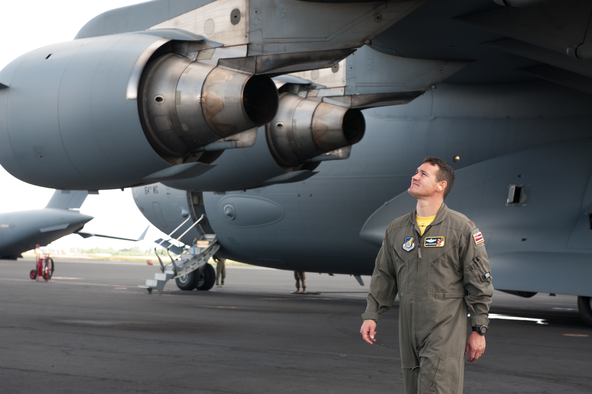The skies aligned for two pilots and former college football players who were able to support their alma maters in a once-in-a-lifetime way on game day. Maj. Britton Komine, 204th Airlift Squadron, and Capt. Nathaniel Dreslinski, 535th Airlift Squadron, flew the C-17 Globemaster III over Aloha Stadium Saturday, Oct. 19, to demonstrate the power of the Air Force’s most flexible cargo aircraft at the U.S. Air Force Academy versus the University of Hawaii football game.