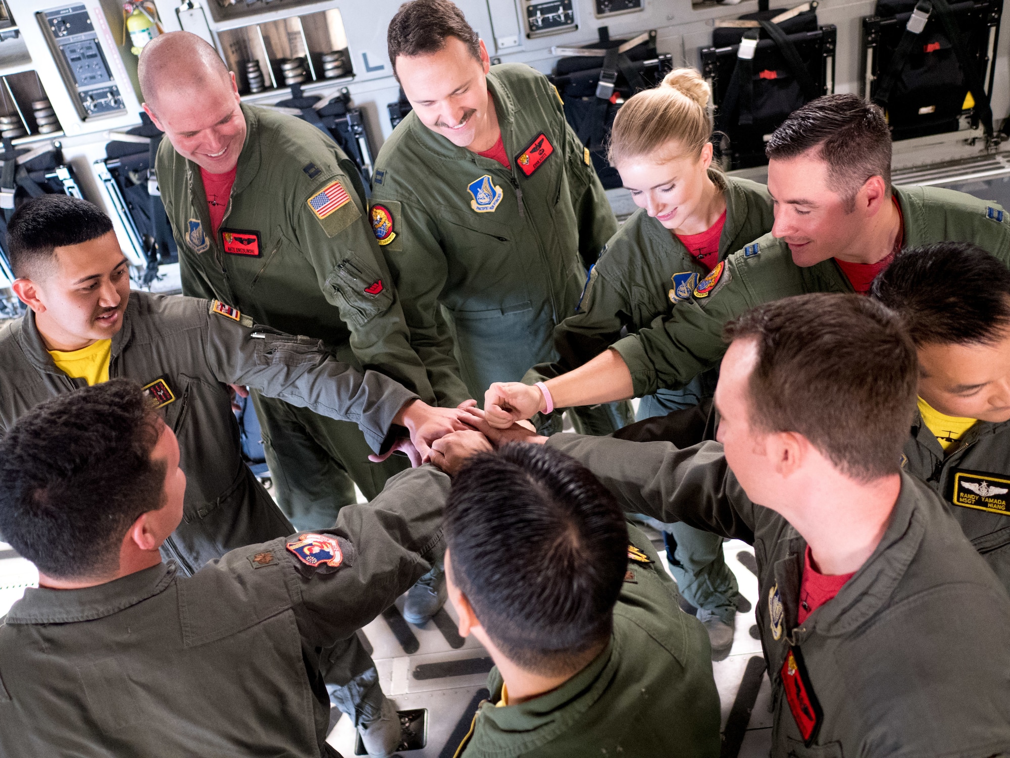 The skies aligned for two pilots and former college football players who were able to support their alma maters in a once-in-a-lifetime way on game day. Maj. Britton Komine, 204th Airlift Squadron, and Capt. Nathaniel Dreslinski, 535th Airlift Squadron, flew the C-17 Globemaster III over Aloha Stadium Saturday, Oct. 19, to demonstrate the power of the Air Force’s most flexible cargo aircraft at the U.S. Air Force Academy versus the University of Hawaii football game.