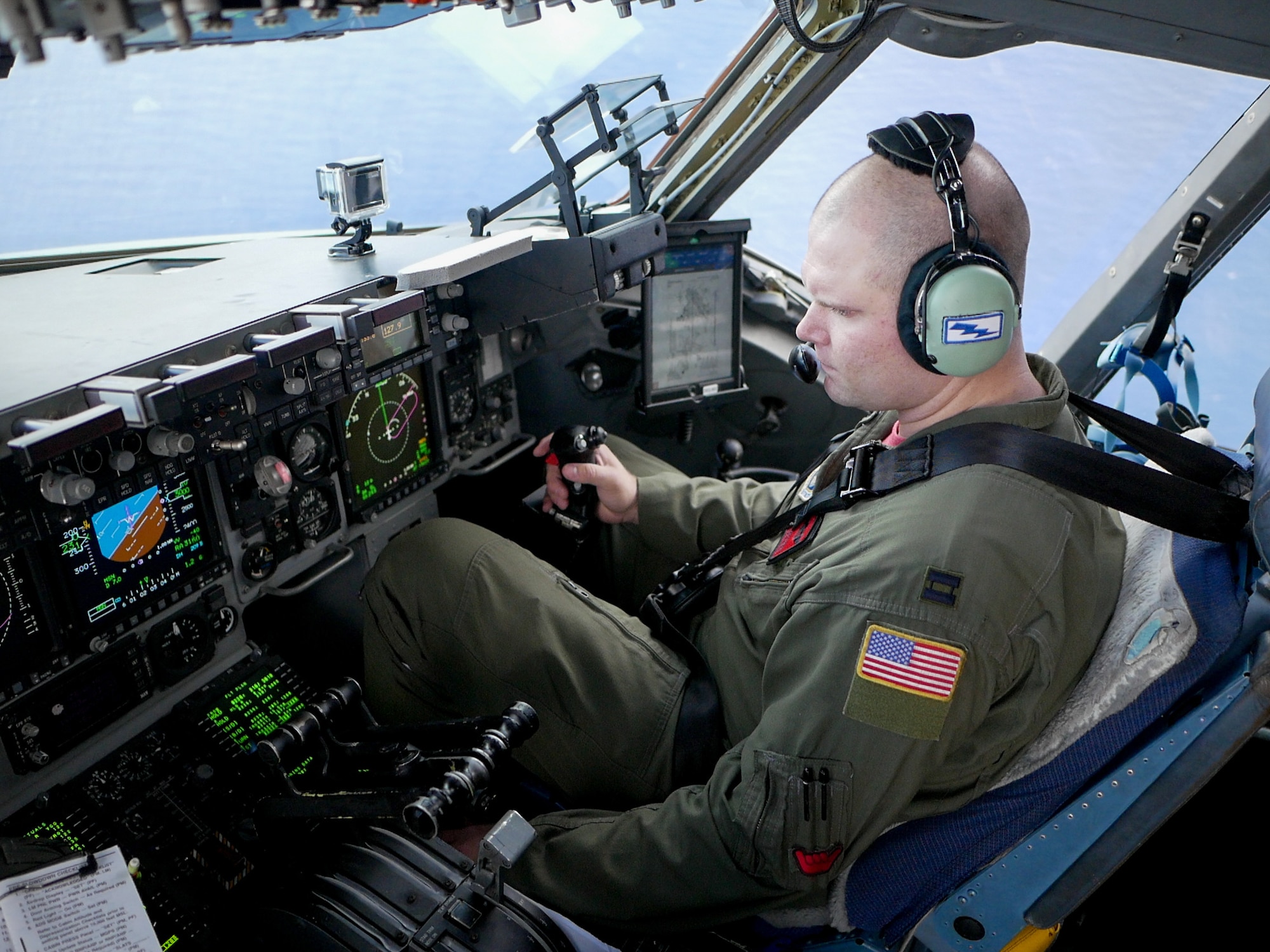The skies aligned for two pilots and former college football players who were able to support their alma maters in a once-in-a-lifetime way on game day. Maj. Britton Komine, 204th Airlift Squadron, and Capt. Nathaniel Dreslinski, 535th Airlift Squadron, flew the C-17 Globemaster III over Aloha Stadium Saturday, Oct. 19, to demonstrate the power of the Air Force’s most flexible cargo aircraft at the U.S. Air Force Academy versus the University of Hawaii football game.