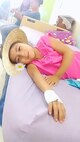 Yenci, a young girl whose arm deformity was identified by Civil Affairs Team