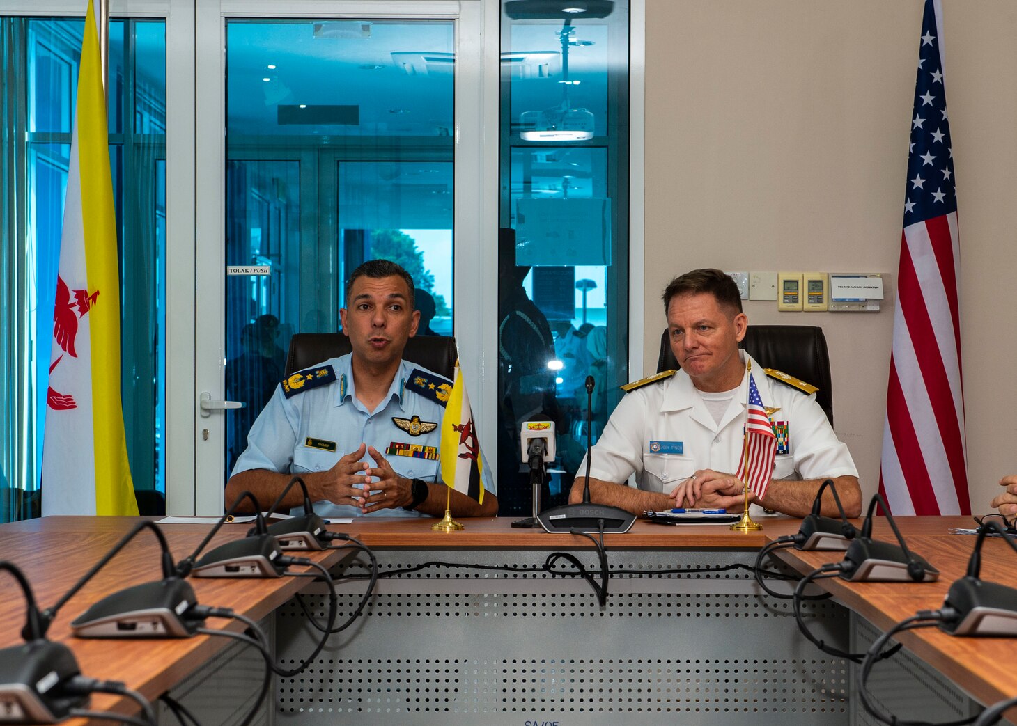 MAURA, Brunei (Oct. 22, 2019) U.S. Navy Rear Adm. Joey Tynch, commander Logistics Group Western Pacific, and Royal Brunei Armed Forces (RBAF) Brig. Gen. Dato Seri Pahlawan Mohd Sharif bin Dato Paduka Haji Ibrahim, RBAF joint force commander, address questions from local media during a media availability event in support of Cooperation Afloat Readiness and Training (CARAT) Brunei. This year marks the 25th iteration of CARAT, a multinational exercise designed to enhance U.S. and partner navies' abilities to operate together in response to traditional and non-traditional maritime security challenges in the Indo-Pacific region.