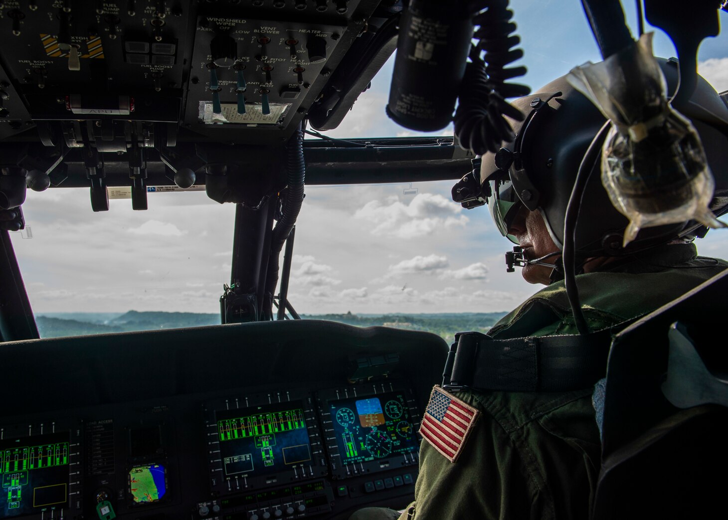 RIMBA AIR BASE, Brunei (Oct. 22, 2019) Rear Adm. Joey Tynch, commander Logistics Group Western Pacific, pilots a Royal Brunei Air Force S-70i Black Hawk helicopter during Cooperation Afloat Readiness and Training (CARAT) Brunei. This year marks the 25th iteration of CARAT, a multinational exercise designed to enhance U.S. and partner navies' abilities to operate together in response to traditional and non-traditional maritime security challenges in the Indo-Pacific region.