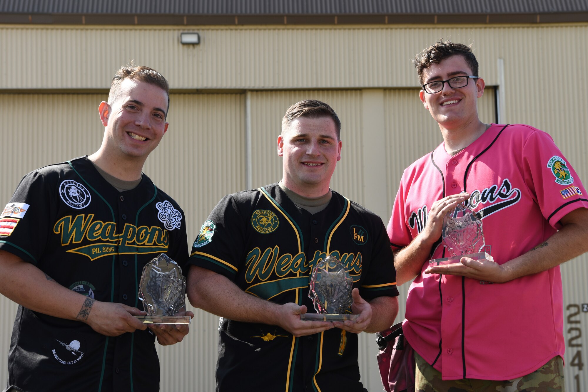 (Left) U.S. Air Force Staff Sgt. Edwin Lozada-Santiago, Staff Sgt. Anthony Ruda and Senior Airman Joseph Capshaw, 25th Aircraft Maintenance Unit load crew members, hold their trophies after winning the 2019 Penn Fest competition at Kunsan Air Base, ROK, Oct. 19, 2019. The 25th AMU was able to load up their ammunition the quickest while maintaining safety for themselves and their A-10 Thunderbolt II aircraft. (U.S. Air Force photo by Staff Sgt. Joshua Edwards)