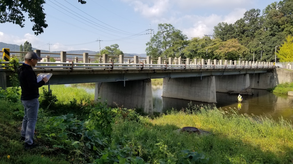 : Far East District structural engineer Choe, Hyon-Ku performs an assessment on a bridge at Camp Casey, Republic of Korea on Oct. 10, 2019. FED file photo.