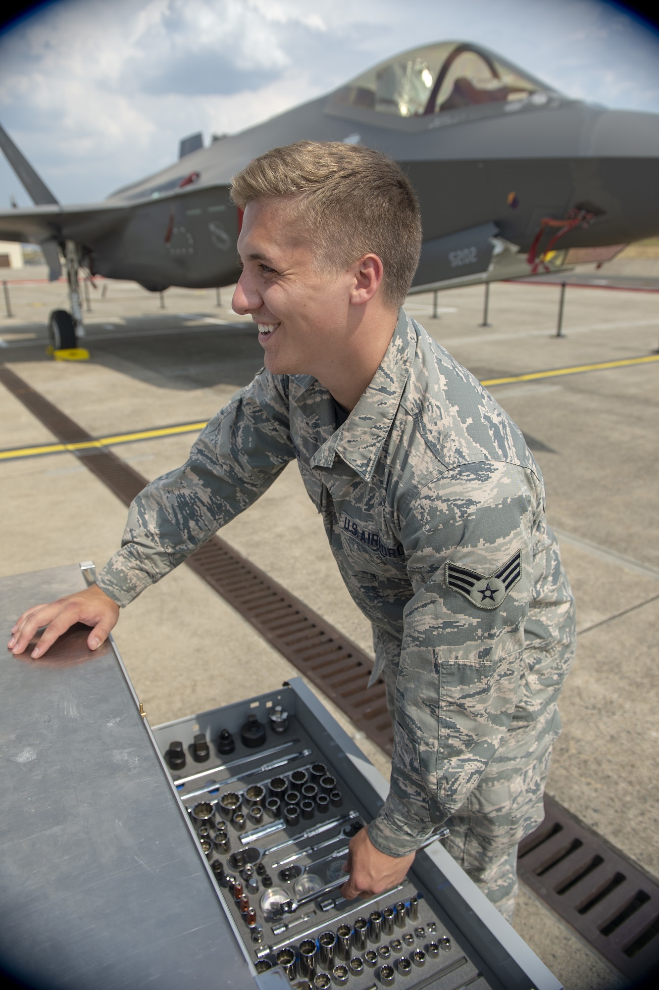 Senior Airman Colby Cook, an F-35A Lightning II crew chief assigned to the 419th Fighter Wing, on the flightline July 26, 2019, at Spangdahlem Air Base, Germany. Cook was deployed with his unit to participate in exercises and conduct training with other Europe-based aircraft as part of a Theater Security Package. (U.S. Air Force photo by Airman 1st Class Branden Rae)