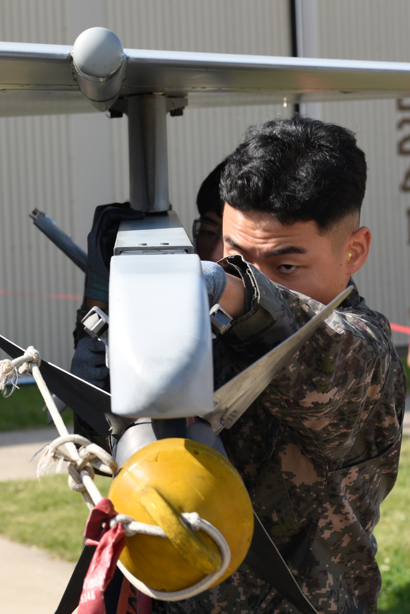 Members of the Republic of Korea air force’s 38th Fighter Group Aircraft Maintenance Unit load a missile onto a KF-16 Fighting Falcon aircraft during the 2019 Penn Fest competition at Kunsan Air Base, Republic of Korea, Oct. 19, 2019. The 38th FG AMU competed against four U.S. Air Force teams and completed their loads with the second quickest times. (U.S. Air Force photo by Staff Sgt. Joshua Edwards)