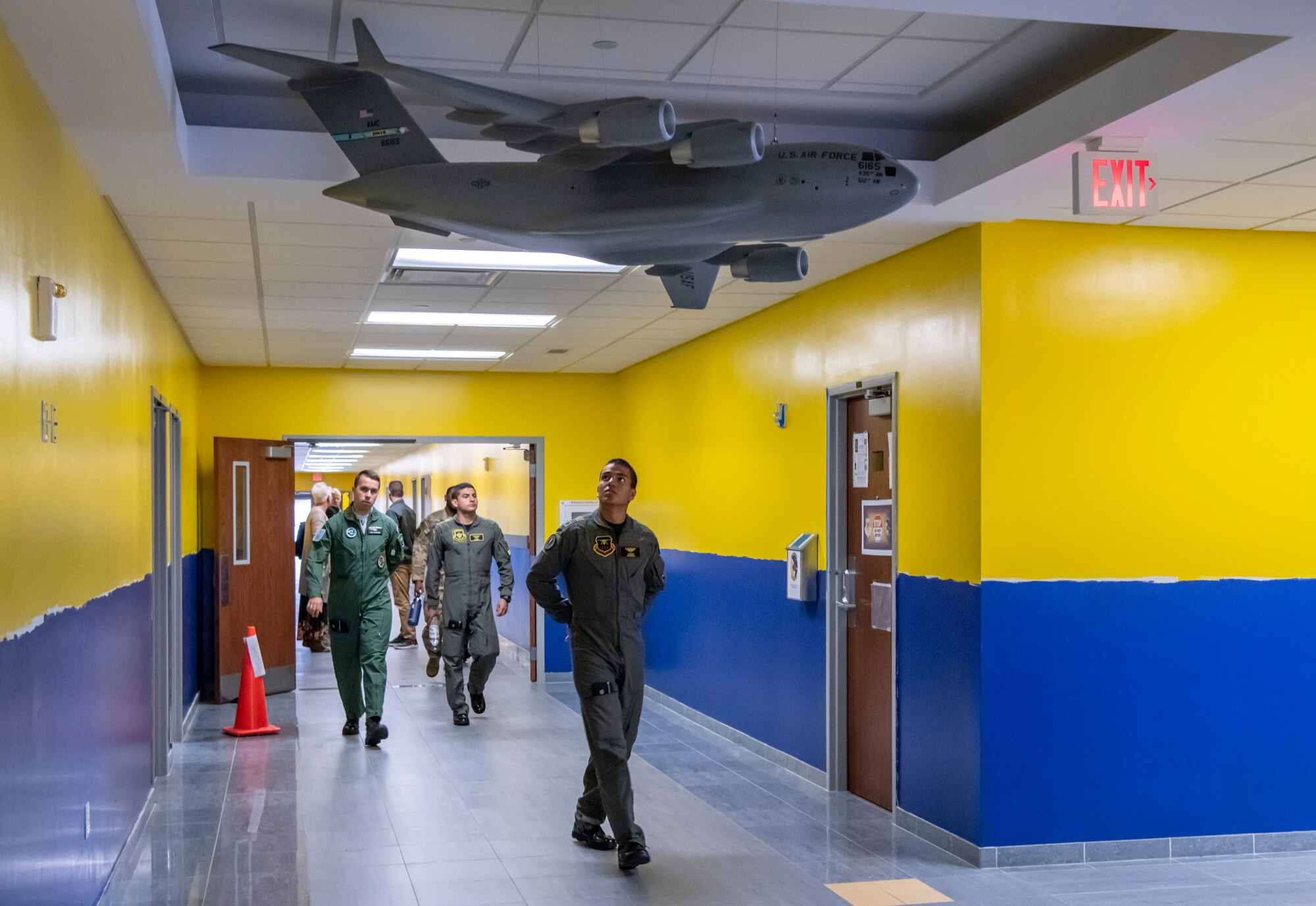 Marco David Barrera Hernandez, Colombian cadet, looks up at a C-17 Globemaster III model Oct. 17, 2019, at Dover Air Force Base, Del. The cadets’ tour started with a welcome from Col. Mike Peeler, 436th Operations Group commander. (U.S. Air Force photo by Senior Airman Christopher Quail)