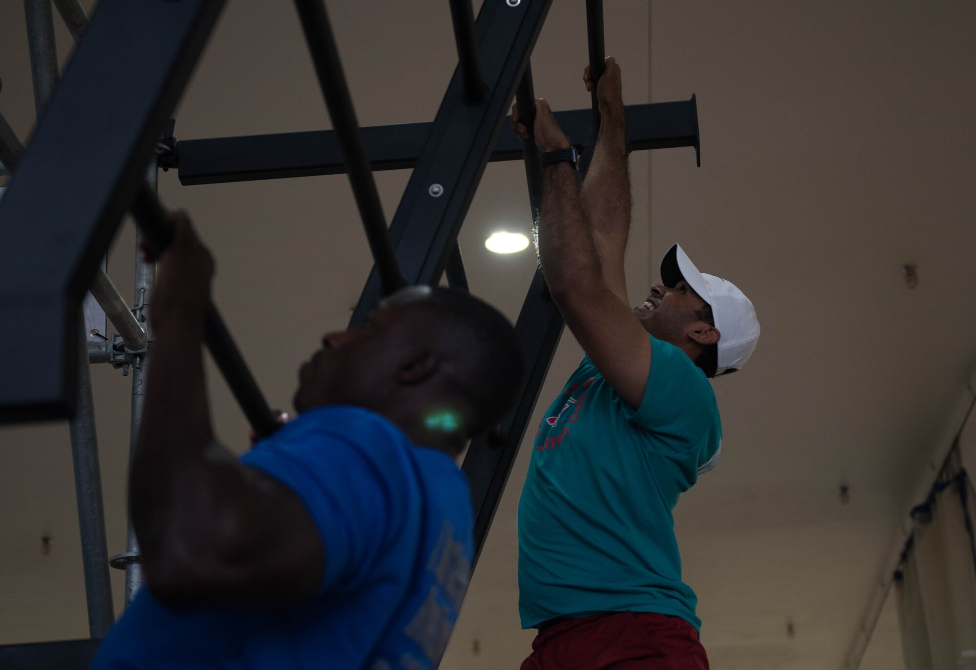 U.S. Air Force Physical Training Leaders from Joint Base Langley-Eustis, Virginia, train on the Battle Rig at the Air Combat Command gym at JBLE Oct. 17, 2019.