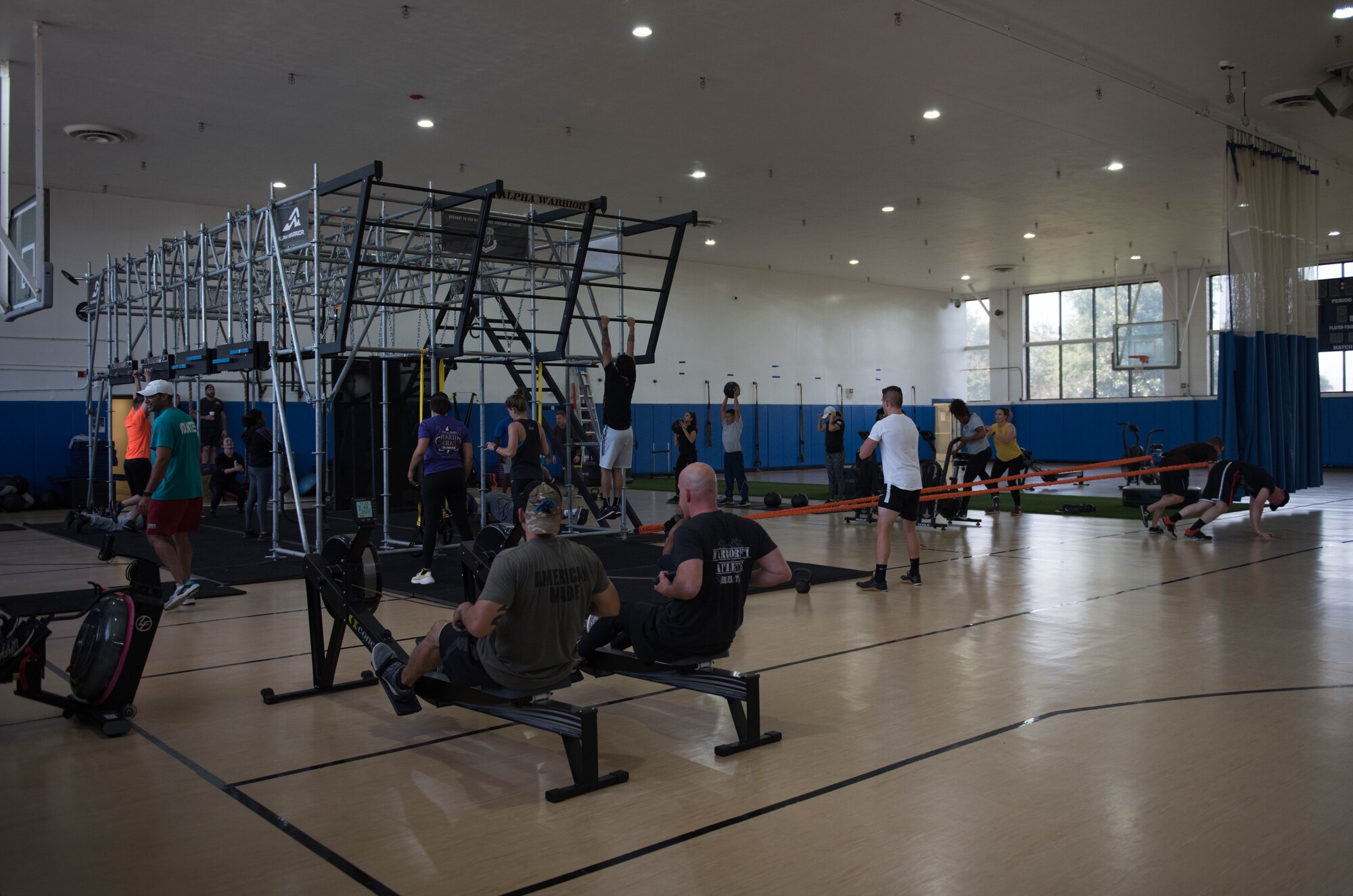 U.S. Air Force Physical Training Leaders from Joint Base Langley-Eustis, Virginia, qualify on the Alpha Warrior Battle Rig at the Air Combat Command gym at JBLE Oct. 17, 2019.