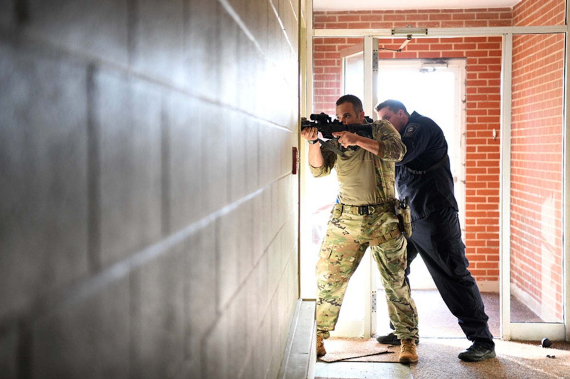 The Ohio Tactical Officers Association (OTOA) provided advanced team tactics training to members of local law enforcement, Oct. 22, 2019, at Springfield-Beckley Air National Guard Base in Springfield, Ohio. Facilities at the Ohio Air National Guard's 178th Wing provided a unique, cost-effective training environment for members of the Springfield Police Department SWAT and Clark County Narcotics Unit to strengthen their skills. (U.S. Air National Guard photo by Staff Sgt. Rachel Simones)