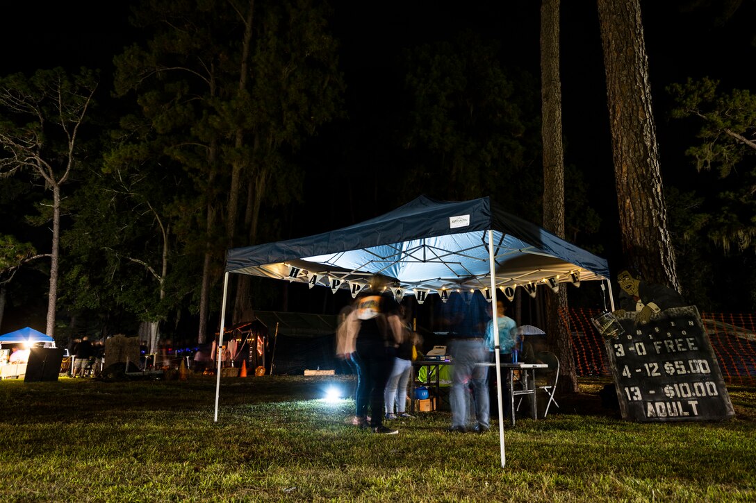Attendees purchase tickets to the 40th Moooody Haunted House Oct. 19, 2019, in Valdosta, Ga. On average, it takes nearly 1,000 volunteer hours to construct and run the haunted house. It costs nearly $5K for the materials and decorations, and requires a minimum of 24 volunteers per night to operate the haunted house. (U.S. Air Force photo by Airman 1st Class Hayden Legg)