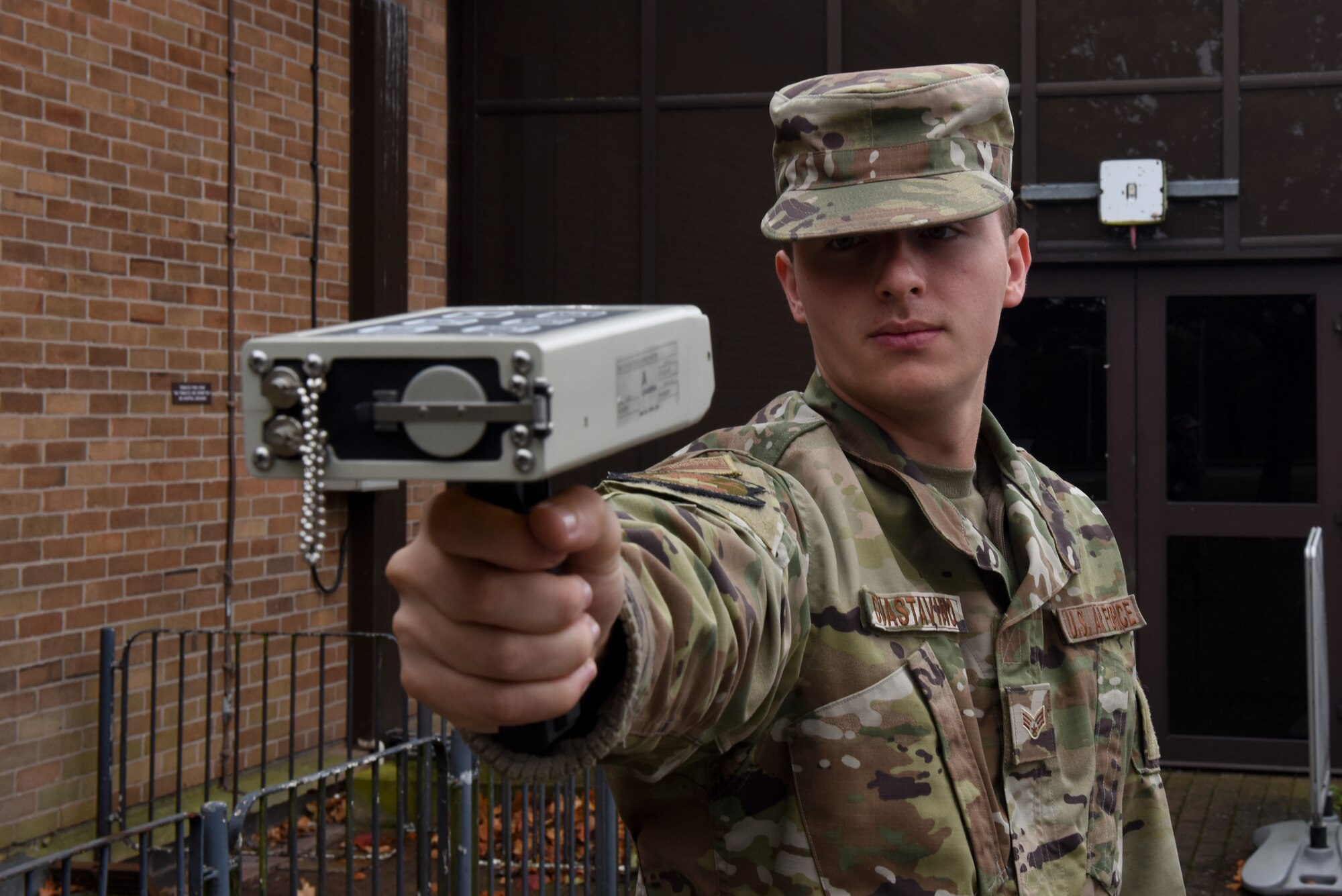 U.S. Air Force Senior Airman Enzo Guastavino, 48th Aerospace Medicine Squadron bioenvironmental technician, demonstrates how to use an ADM-300 radiation detection device at Royal Air Force Lakenheath, England, Oct. 4, 2019. The ADM-300 can be used in all environments to detect Gamma and Beta radiation (U.S. Air Force photo by Airman 1st Class Rhonda Smith)