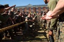 U.S. Marines with Marine Corps Security Force Regiment (MCSFR) participate in tug-of-war competition during a field meet October 18, 2019 at Naval Weapons Station Yorktown, Virginia.