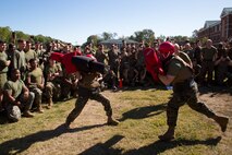 U.S. Marines with Marine Corps Security Force Regiment (MCSFR) battle with pugil sticks during a field meet October 18, 2019 at Naval Weapons Station Yorktown, Virginia.