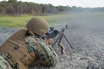 U.S. Marine Corps Master Sgt. Patrick H. Hammer, a student in the Marine Advisor Course, fires a PKM machine gun during foreign weapons training in Moyock, North Carolina, Sept. 17, 2019.
