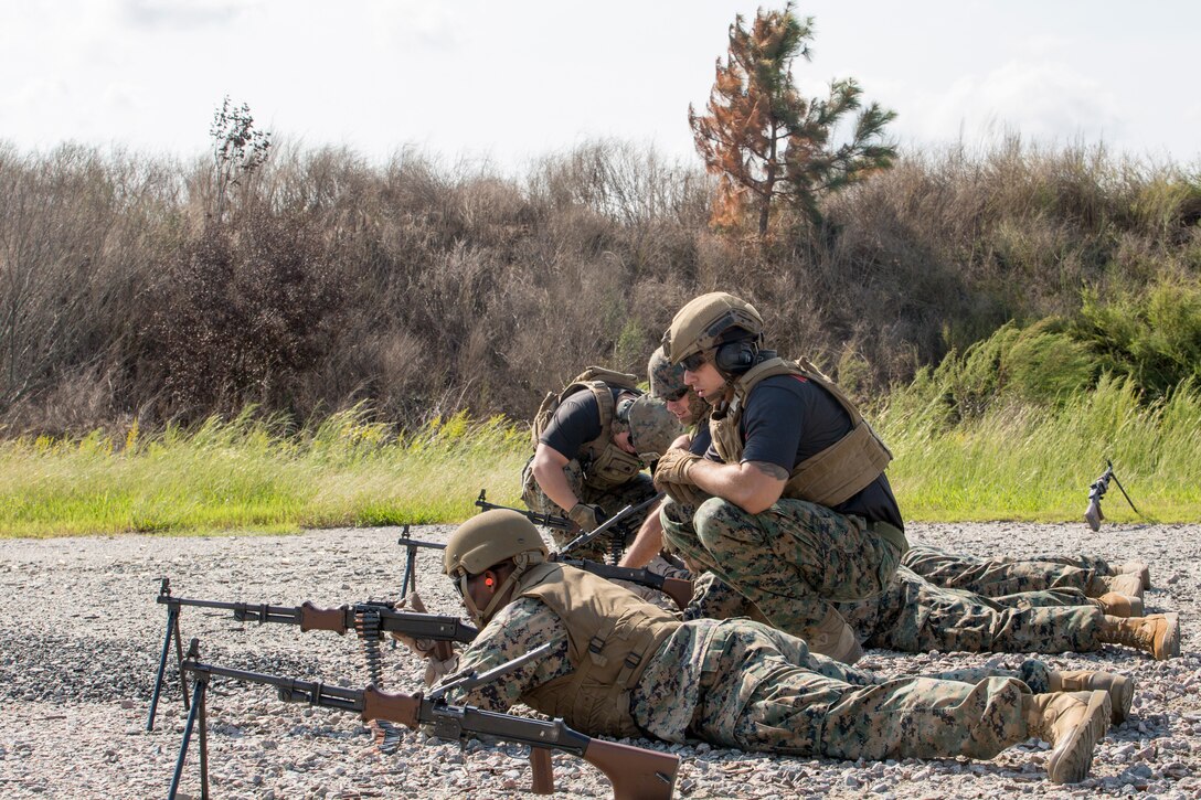 U.S. Marine Corps Master Sgt. Patrick H. Hammer, a student in the Marine Advisor Course, fires a PKM machine gun during foreign weapons training in Moyock, North Carolina, Sept. 17, 2019. The range focuses on common foreign security force weapon systems that Marines are likely to encounter when they advise foreign security forces. (U.S. Marine Corps photo by Sgt. Danielle Prentice)