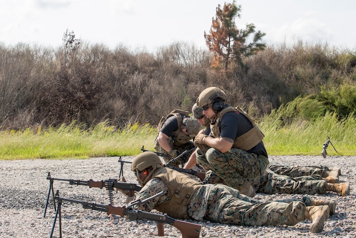 U.S. Marine Corps Master Sgt. Patrick H. Hammer, a student in the Marine Advisor Course, fires a PKM machine gun during foreign weapons training in Moyock, North Carolina, Sept. 17, 2019.