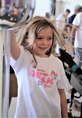 IMAGE: VIRGINIA BEACH, Va. (Sept. 20, 2019) – One of 7,000 fifth-graders from Chesapeake and Virginia Beach elementary schools touches a static electricity demonstration causing her hair to standup at Naval Air Station Oceana’s fourth annual Science, Technology, Engineering and Mathematics (STEM) Lab. The event broke the Guinness World Record for the largest field trip on record. More than 30 scientists and engineers from Naval Surface Warfare Center Dahlgren Division (NSWCDD) Dam Neck Activity and NSWCDD volunteered their time and talents to educate the students through hands-on STEM displays. (U.S. Navy photo by George Bieber/Released)