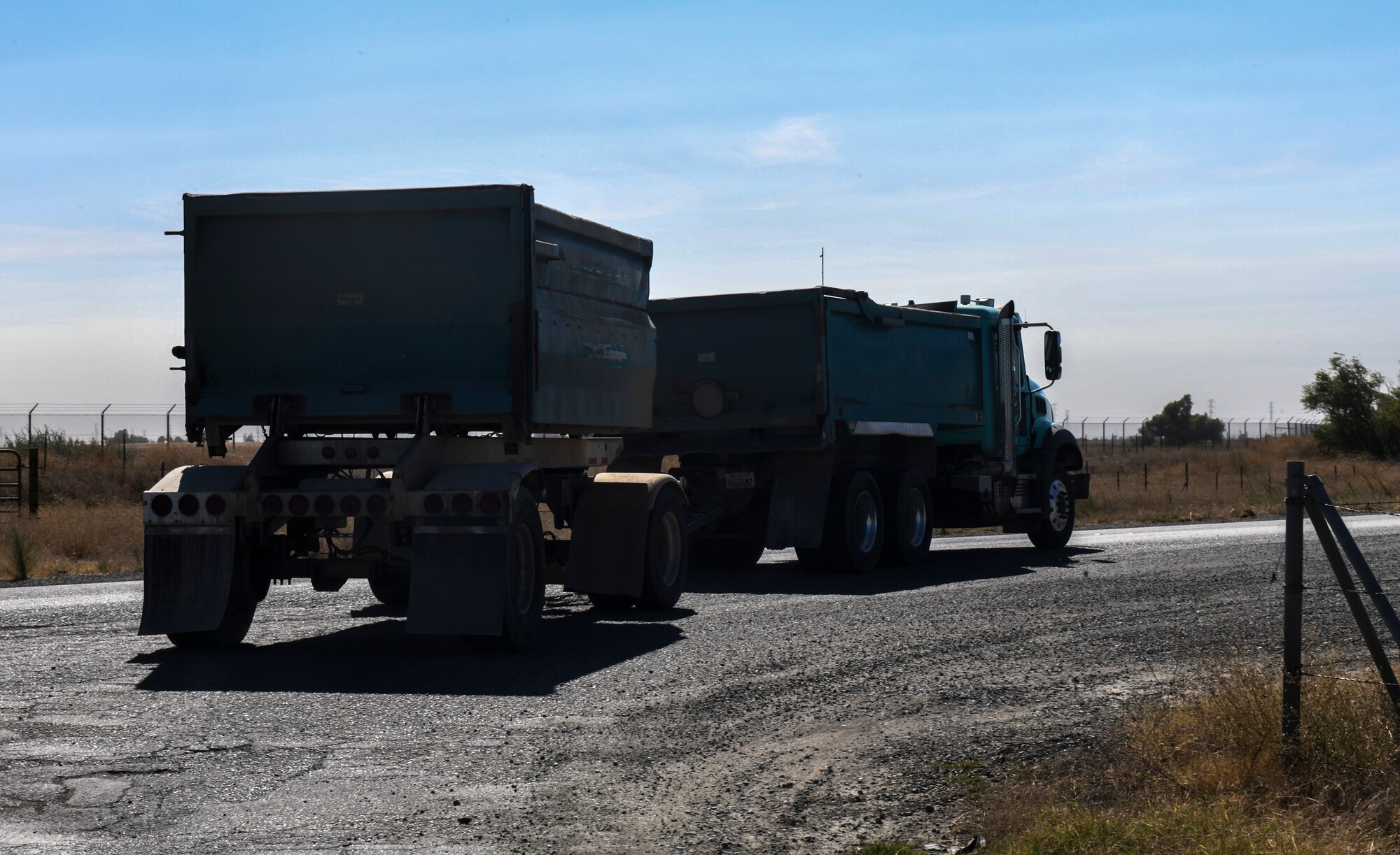 A contracted truck drives off after being weighed in Marysville, California, Oct. 10, 2019. There are some indicators that can be used to identify a truck but the license tags are not good indicators to use because the trailer gets switched multiple times to different trucks. (U.S. Air Force Photo by Senior Airman Colville McFee)