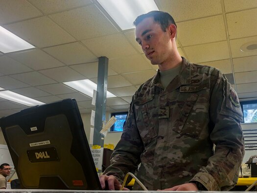 U.S. Air Force Senior Airman Matthew Day, 20th Operations Support Squadron aircrew flight equip journeyman works on a shop computer at Shaw Air Force Base, South Carolina, Oct. 10, 2019.