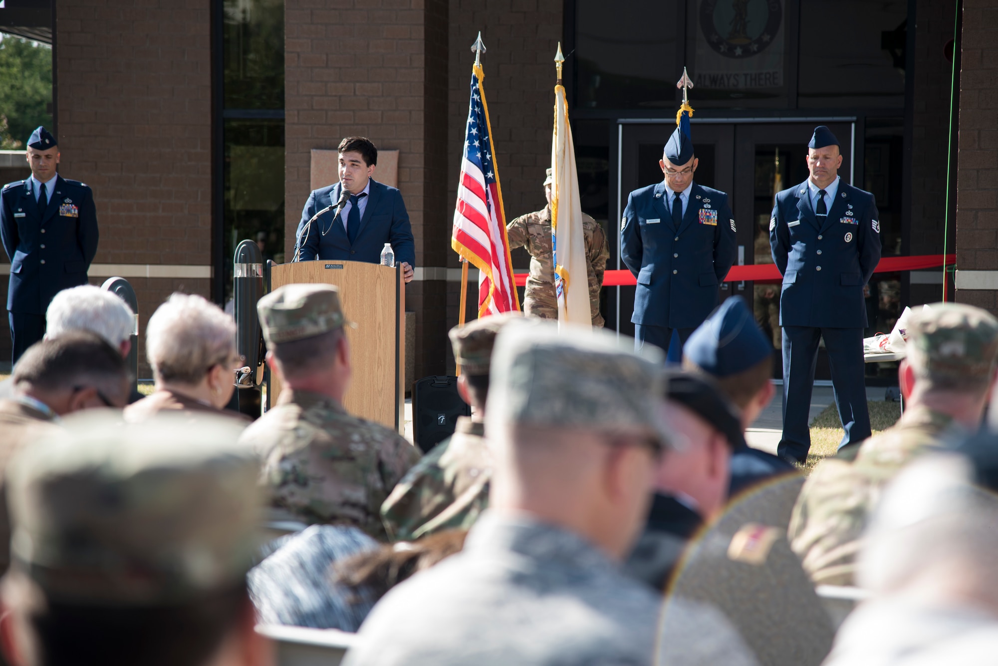 Matty Malava, Capt. Robert M. Mendez's stepson, speaks during the 108th Civil Engineer Squadron building's dedication ceremony at Joint Base McGuire-Dix-Lakehurst, N.J., Oct. 19, 2019. The building was dedicated to Mendez who passed away in January 2017 after being diagnosed with kidney cancer in late 2018. Mendez was the deputy base civil engineer for the 108th CES. (U.S. Air National Guard photo by Senior Airman Julia Santiago)