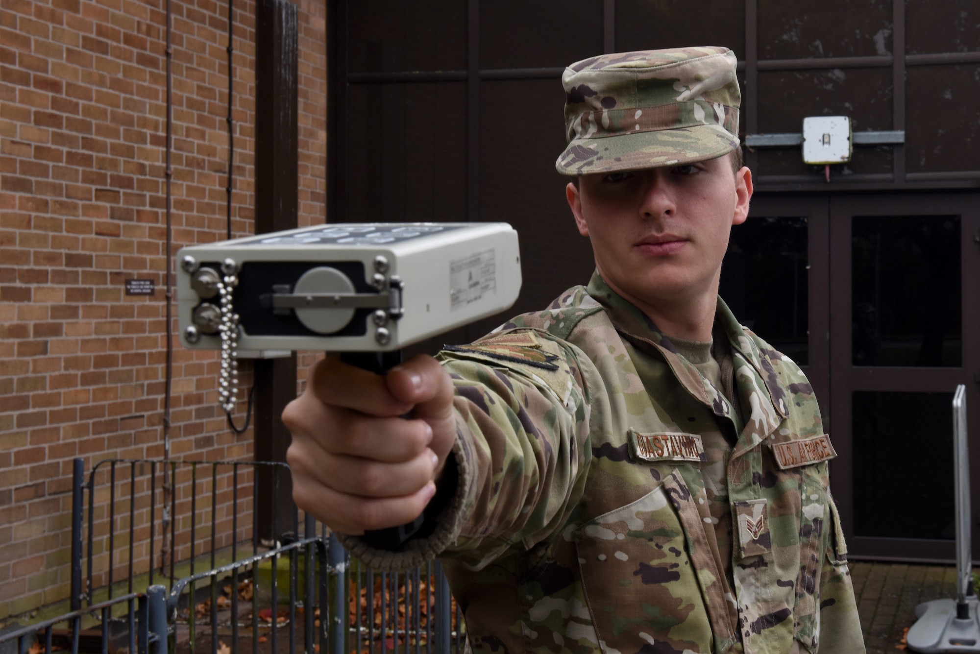 Senior Airman Enzo Guastavino, bioenvironmental technician assigned to the 48th Aerospace Medicine Squadron, demonstrates how to use an ADM-300 radiation detection device at Royal Air Force Lakenheath, England, Oct. 4, 2019. The ADM-300 can be used in all environments to detect Gamma and Beta radiation (U.S. Air Force photo by Airman 1st Class Rhonda Smith)