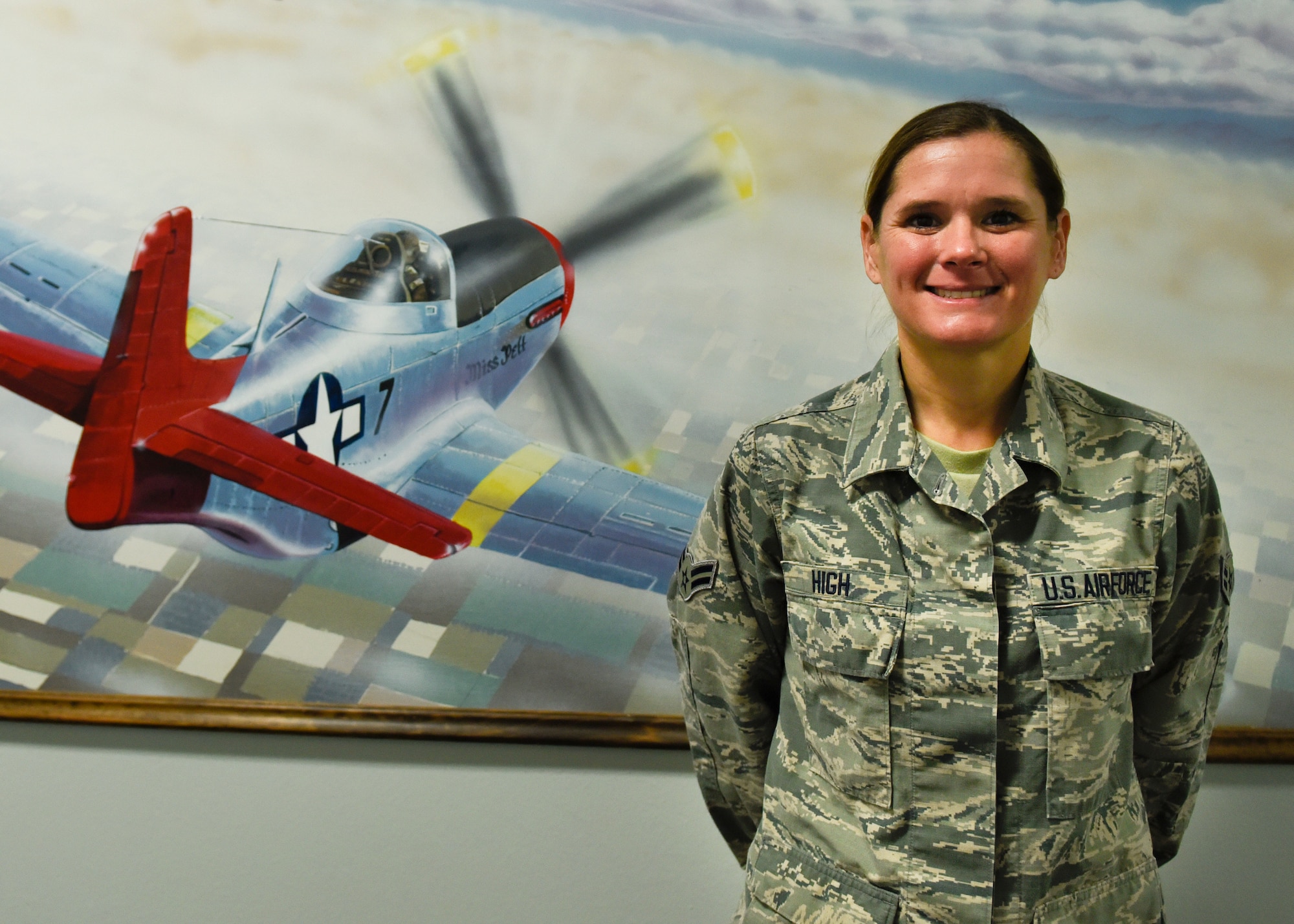 Airman 1st Class Dana High, 363rd Training Squadron maintenance management production apprentice course graduate, poses for a photo at Sheppard Air Force Base, Texas, Oct. 23, 2019. High was awarded the ACE award after receiving 100 percent scores on all six block tests in 33 days of instruction at Sheppard. (U.S. Air Force photo by Airman 1st Class Pedro Tenorio)