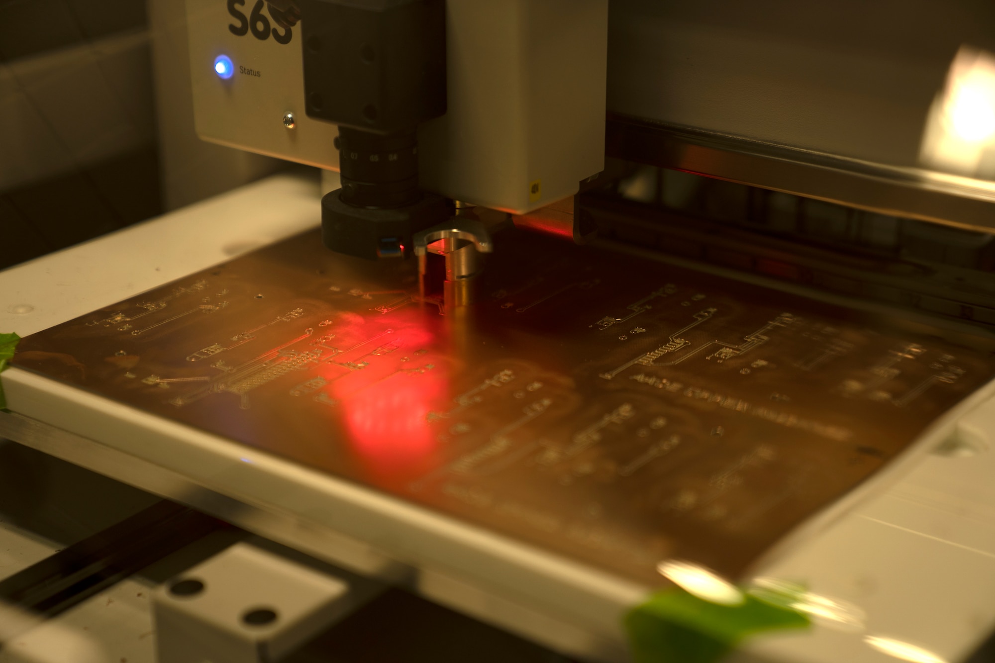 A lasercutting machine carves a circuit board designed by the Trainer Development Center at Keesler Air Force Base, Mississippi, Oct. 2, 2019. The Trainer Development Center produces equipment to further the innovative qualities for Air Force training while staying cost effective. (U.S. Air Force photo by Airman 1st Class Kimberly L. Mueller)