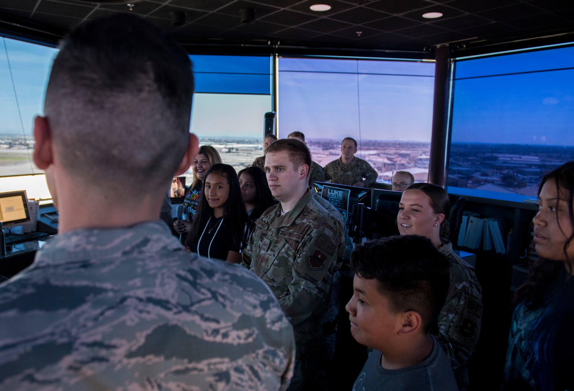 Air traffic controllers from the 56th Operations Support Squadron give a tour of the air traffic control tower during the Childhelp Kids Day of Hope tour Oct. 16, 2019, at Luke Air Force Base, Ariz.