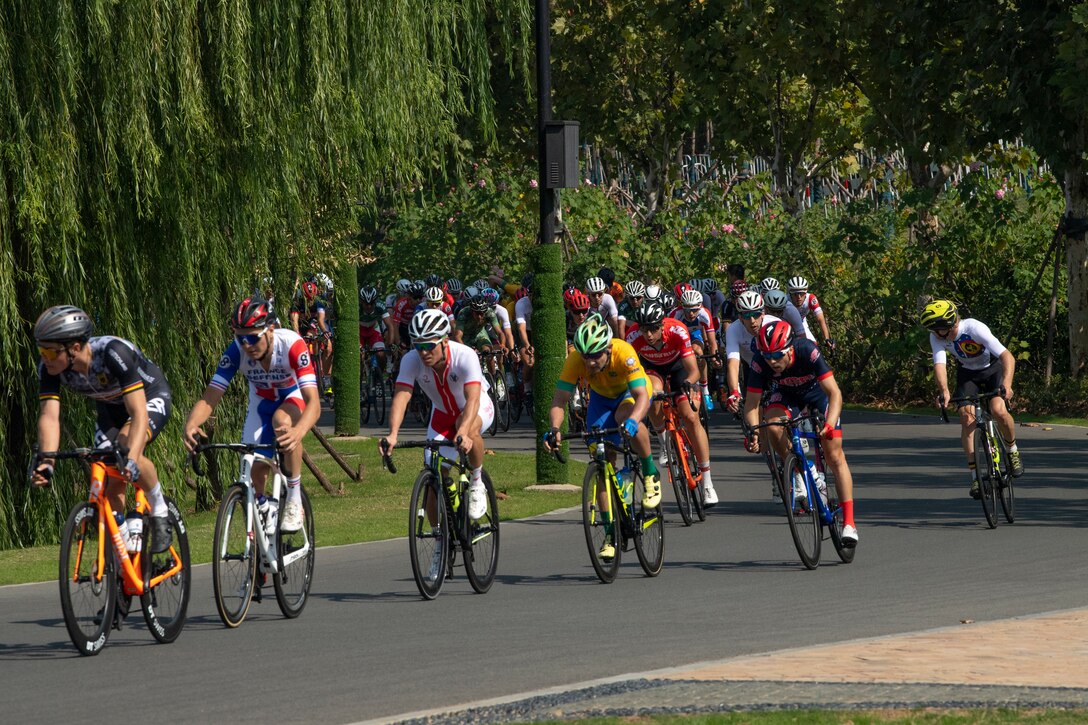 Bicyclists turn a corner during an 80-mile race.