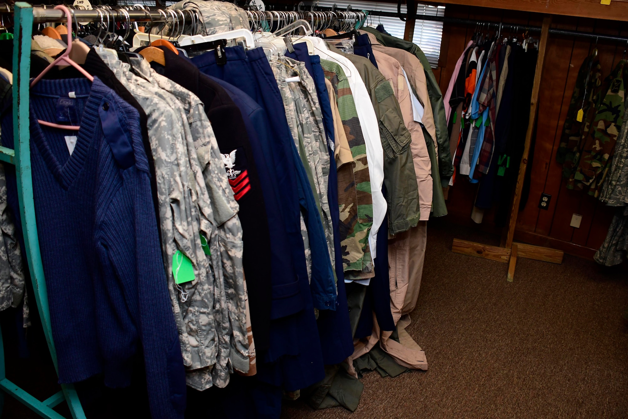 A variety of uniform items are on display at the Dobbins Thrift Shop. When an item is donated, 100% of the profits go to the thrift shop, which in turn donates all of its proceeds to charity. When an item is consigned, the person selling the item gets 80% of the sell price and the thrift shop retains the rest. (U.S. Air Force photo/Tech. Sgt. Andrew Park)