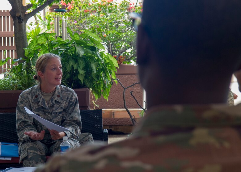 Maj. Kirsten DeLambo, 15th Medical Group Mental Health flight commander, leads a discussion about mindfulness at the 613th Air Operations Center on Joint Base Pearl Harbor-Hickam, Hawaii, Oct. 16, 2019. The Holistic Health Team is comprised of representatives from the helping agencies and the medical community to include mental health, flight medicine, health promotions, sexual assault response coordinator, chaplain, and violence prevention integrator. The team visits the 613th AOC and the 56th Air and Space Communications Squadron twice a month. (U.S. Air Force photo by Staff Sgt. Mikaley Kline)