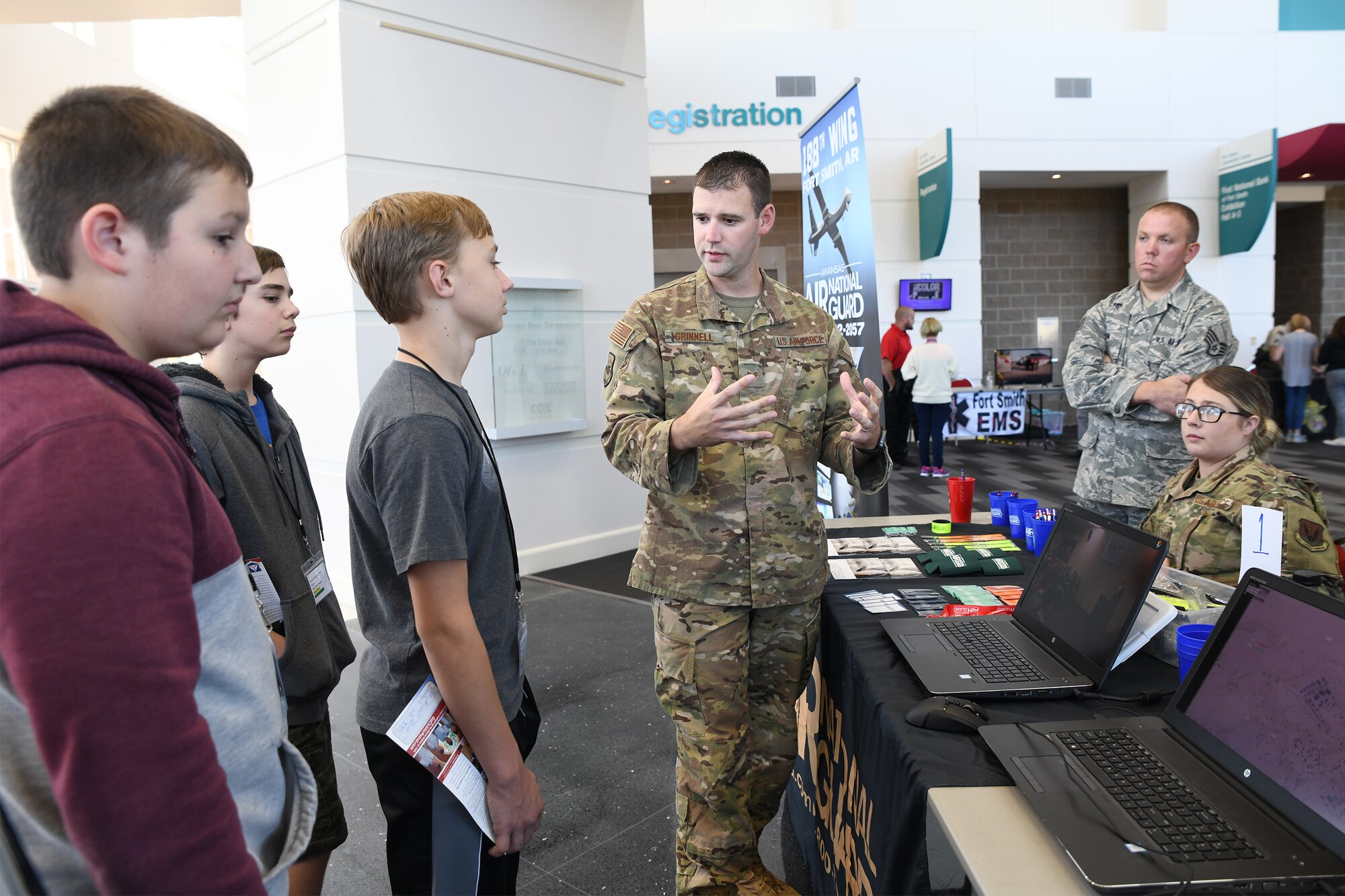 Staff Sgt. Ryan Grinnell, an intelligence analyst with the 123rd Intelligence Squadron, demonstrates a computer simulation of an intelligence, surveillance, and reconnaissance mission to area junior high students at the Fort Smith Public Schools’ ICan Career Expo, held Oct. 22, 2019, in Fort Smith, Arkansas. The 188th Wing’s mission combines ISR, remotely piloted aircraft and targeting to serve state and national military objectives. (U.S. Air National Guard photo by Tech. Sgt. John E. Hillier)
