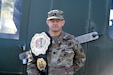 Lt. Col. Pete Caragher, Deputy G-3, 85th U.S. Army Support Command, pauses for a photo with his first place belt in the expert category from the 2012 New England Championships in Springfield, Massachusetts.