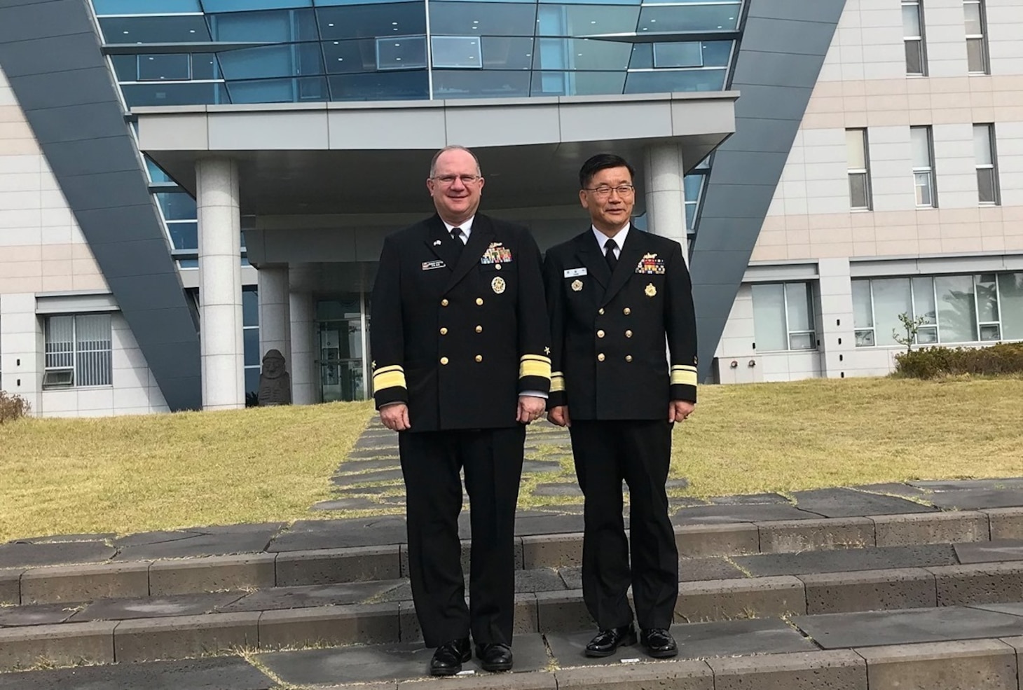 JEJU, South Korea (Oct. 23, 2019) – Rear Adm. Jimmy Pitts, Commander, Submarine Group 7, left, poses with Rear Adm. Jung Il Shik, Commander, ROK Navy Submarine Force during a visit to Jeju, South Korea for the 50th semiannual Submarine Warfare Committee Meeting (SWCM). Over the past 25 years, leaders of both the U.S. and ROK submarine forces have met consistently in recognition of the importance of combined submarine training and force integration.