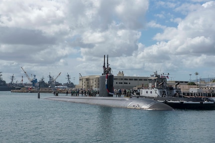 PEARL HARBOR, Hawaii (Oct. 21, 2019) - The Los Angeles-class fast-attack submarine USS Springfield (SSN 761) makes its homecoming arrival at Joint Base Pearl Harbor-Hickam, after completing a change of homeport from Kittery, Maine. The submarine's ability to support a multitude of missions, including anti-submarine warfare, anti-surface ship warfare, strike warfare, surveillance and reconnaissance, has made Springfield one of the most capable submarines in the world. (U.S. Navy photo by Chief Mass Communication Specialist Amanda R. Gray/Released)