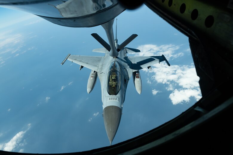 A Republic of Korea Air Force F-16D Falcon performs refuel training with a KC-135 Stratotanker from the 909th Air Refueling Squadron, Kadena Air Base, Japan, during a training exercise Oct. 8, 2019. The 909th ARS helps ensure a free-and-open Indo-Pacific by providing air refueling to U.S., allies and partners within the area of responsibility. The 909th trained with Republic of Korea Air Force F-16D Falcons as part an ongoing military alliance. The U.S.-ROK partnership is increasingly global in nature and our countries are partners on a broad range of security, development and economic initiatives around the world. (U.S. Air Force photo by Senior Airman Matthew Seefeldt)