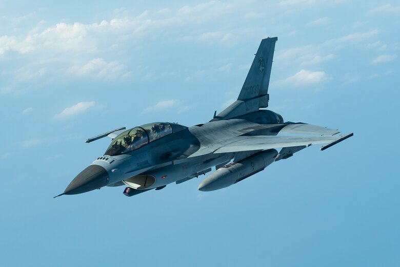 A Republic of Korea Air Force F-16D Falcon flies during a training exercise Oct. 8, 2019. The Fighting Falcon's key features include a frameless bubble canopy for better visibility, side-mounted control stick to ease control while maneuvering, an ejection seat reclined 30 degrees from vertical to reduce the effect of g-forces on the pilot, and the first use of a relaxed static stability/fly-by-wire flight control system which helps to make it an agile aircraft. The ROKAF has flown the F-16D since 1989. (U.S. Air Force photo by Senior Airman Matthew Seefeldt)