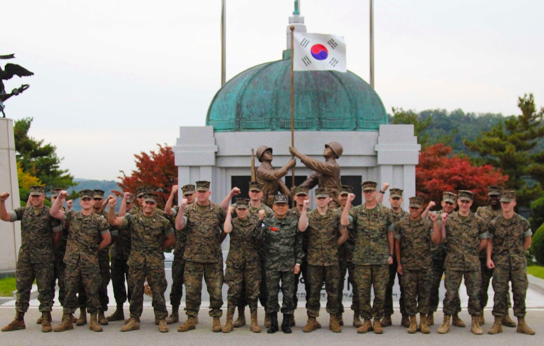 U.S. Marines with U.S. Marine Corps Forces, Korea pose for a photo with the Commandant of the Republic of Korea Marine Corps, Lt. Gen. Lee, Seung-do before a field meet hosted by the ROK Marine Corps, October 23. The Marines competed in multiple games and competitions including soccer, dodge ball, a three legged race, and a 1200 meter relay race. The field meet enhanced the ROK-U.S. Alliance and strengthened the relationship between the two countries’ Marine Forces. (Official U.S. Marine Corps photos by Sgt. Parker Golz)