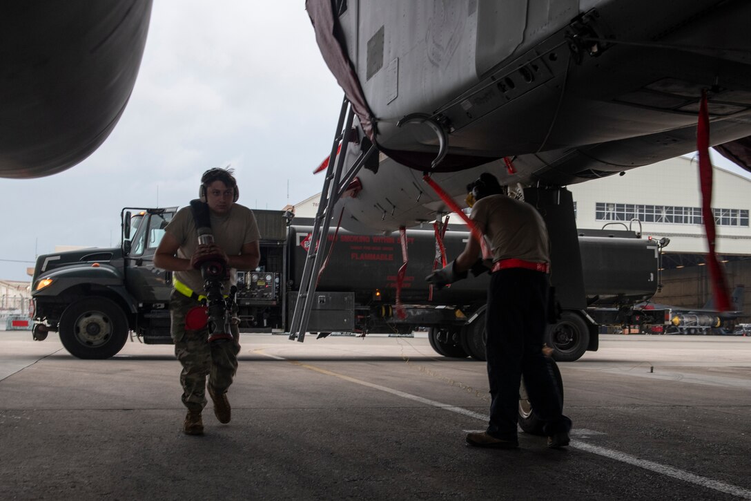 U.S. Air Force Airman 1st Class Auggie Toppo, 18th Logistics Readiness Squadron fuels distribution operator, prepares to refuel an F-15C Eagle at Kadena Air Base, Japan, Sept. 18, 2019. The 18th LRS petroleum, oil and lubricants flight supports all home station and transient aircraft, managing 1.3M gallons of fuel annually for 320 organizations. (U.S. Air Force photo by Tech. Sgt. Matthew B. Fredericks)